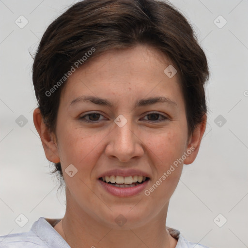 Joyful white adult female with short  brown hair and brown eyes