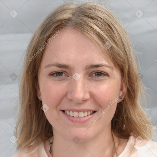 Joyful white young-adult female with medium  brown hair and blue eyes