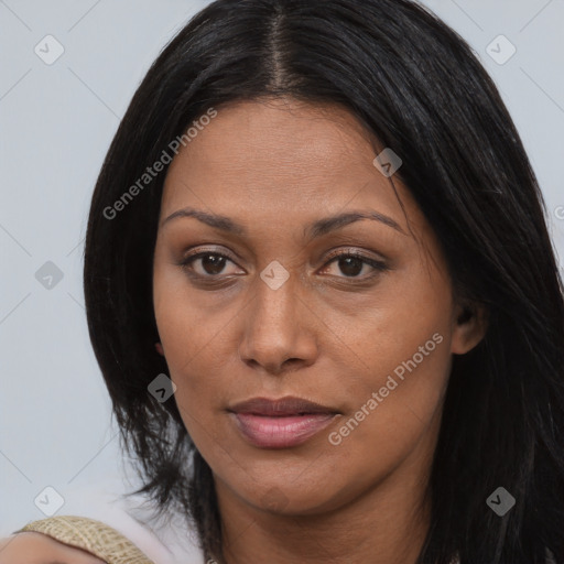 Joyful asian young-adult female with long  brown hair and brown eyes