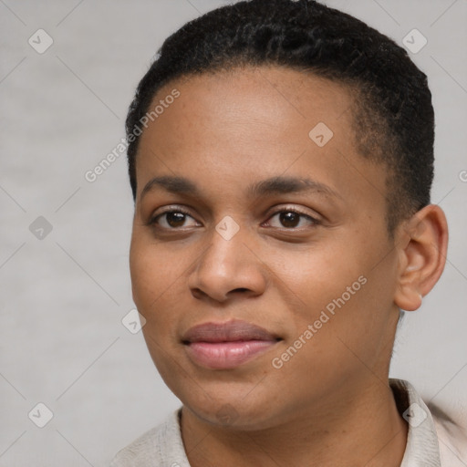 Joyful black young-adult female with short  brown hair and brown eyes