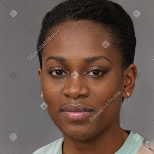 Joyful black young-adult female with short  brown hair and brown eyes