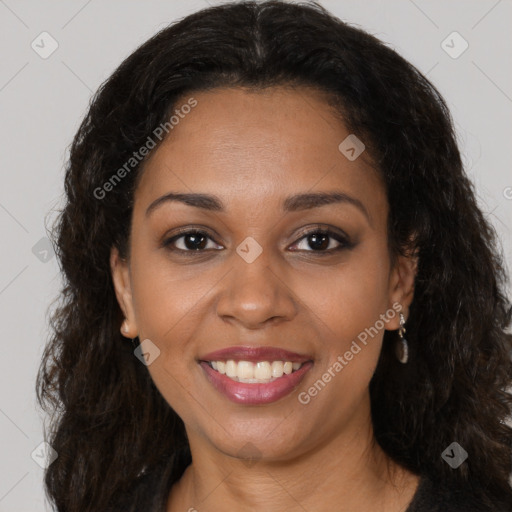 Joyful black young-adult female with long  brown hair and brown eyes