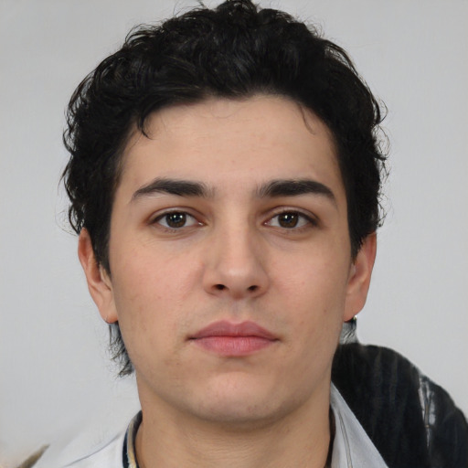 Neutral white young-adult male with short  black hair and brown eyes