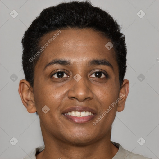 Joyful black young-adult male with short  brown hair and brown eyes