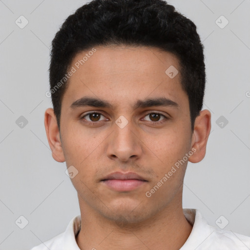 Neutral latino young-adult male with short  black hair and brown eyes