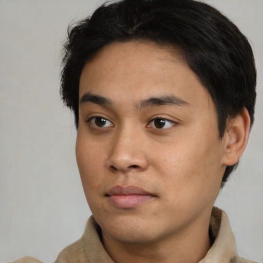 Neutral asian young-adult male with short  brown hair and brown eyes