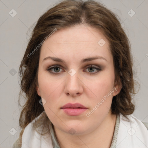 Joyful white young-adult female with medium  brown hair and green eyes