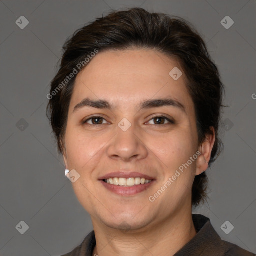 Joyful white adult female with medium  brown hair and brown eyes