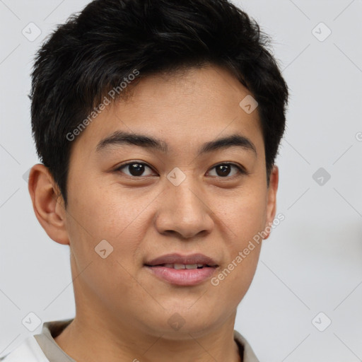Joyful asian young-adult male with short  brown hair and brown eyes