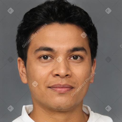 Joyful asian young-adult male with short  black hair and brown eyes