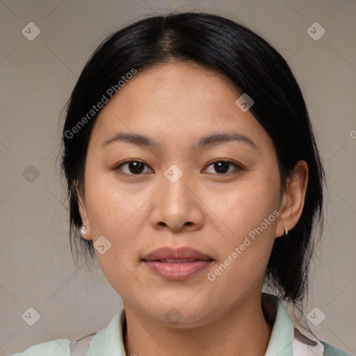 Joyful asian young-adult female with medium  brown hair and brown eyes