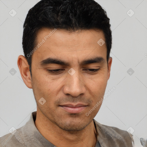 Joyful asian young-adult male with short  black hair and brown eyes