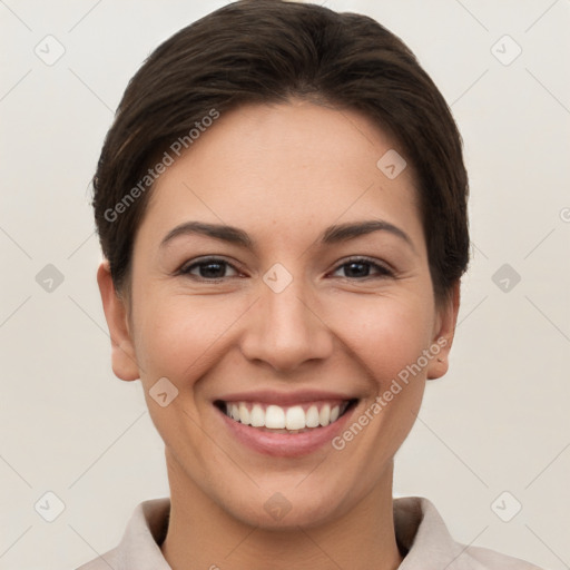 Joyful white young-adult female with short  brown hair and brown eyes