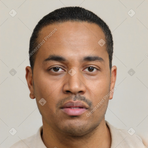 Neutral latino young-adult male with short  black hair and brown eyes