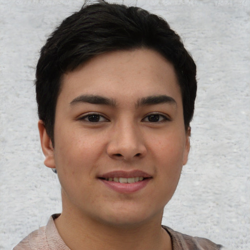 Joyful asian young-adult female with short  black hair and brown eyes