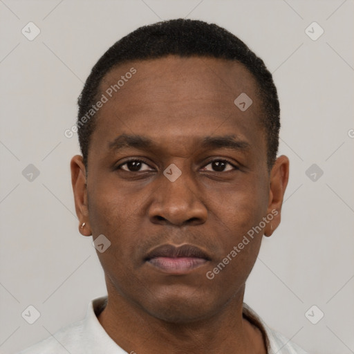 Neutral black young-adult male with short  black hair and brown eyes