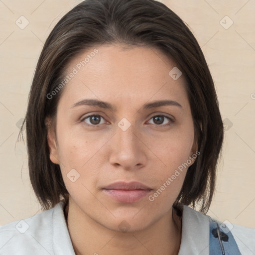 Neutral white young-adult female with medium  brown hair and brown eyes