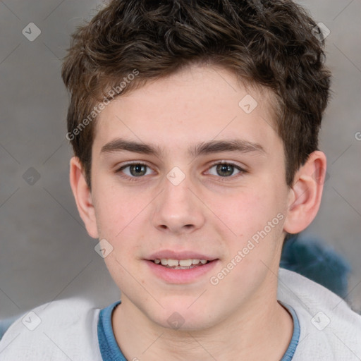 Joyful white child male with short  brown hair and brown eyes