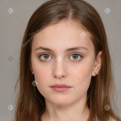 Neutral white young-adult female with long  brown hair and brown eyes