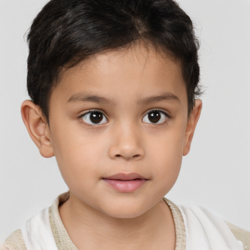 Joyful white child female with short  brown hair and brown eyes