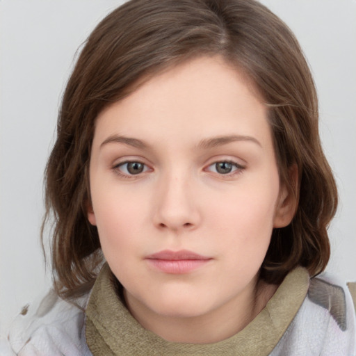 Neutral white young-adult female with medium  brown hair and grey eyes