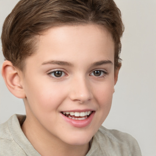 Joyful white child female with short  brown hair and brown eyes