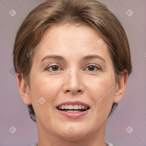 Joyful white adult female with short  brown hair and brown eyes