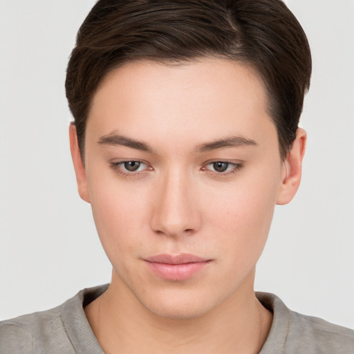 Neutral white young-adult female with short  brown hair and brown eyes