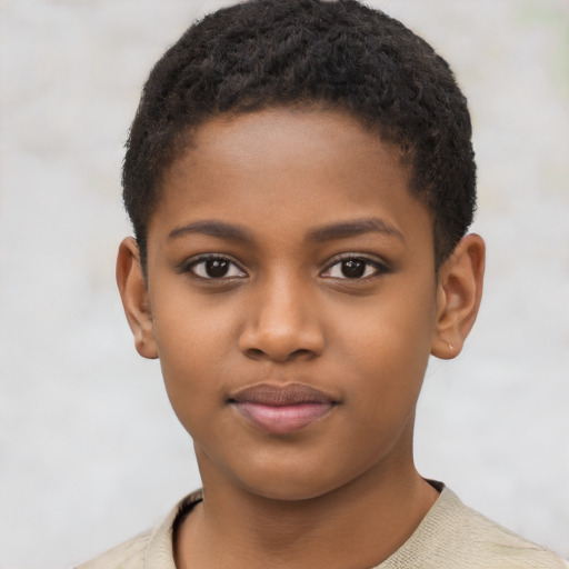 Joyful black child female with short  brown hair and brown eyes