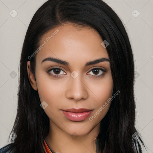 Joyful latino young-adult female with long  black hair and brown eyes