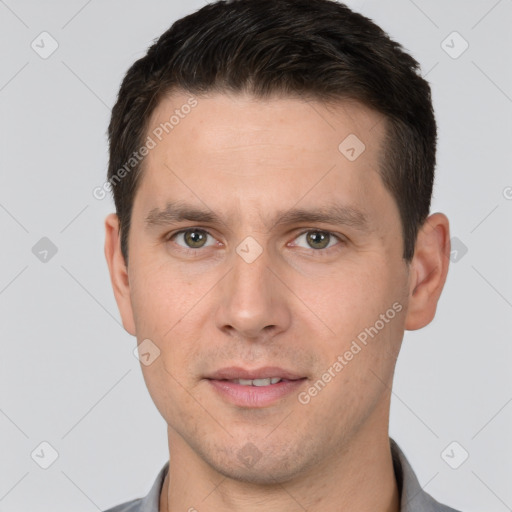 Joyful white young-adult male with short  brown hair and brown eyes