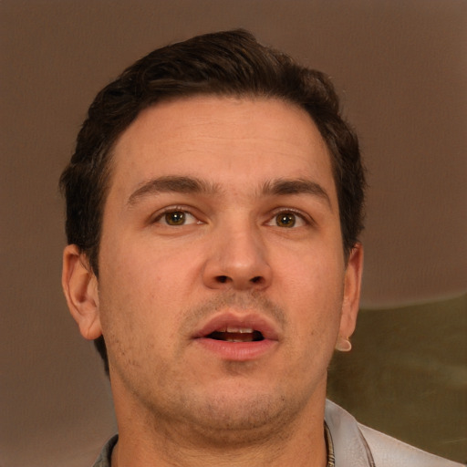 Neutral white adult male with short  brown hair and brown eyes