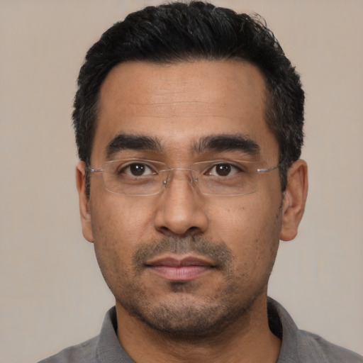 Neutral asian adult male with short  black hair and brown eyes