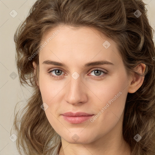 Joyful white young-adult female with long  brown hair and green eyes