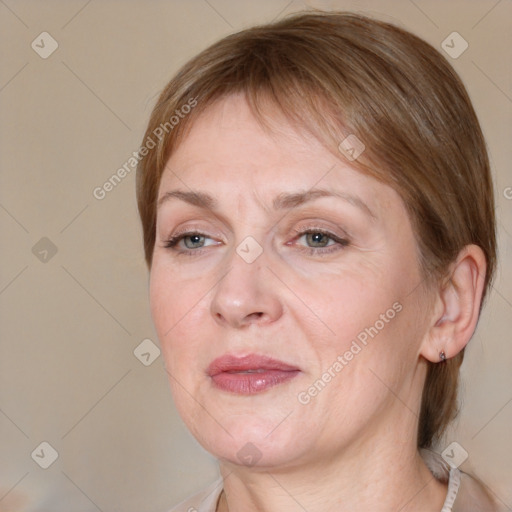 Joyful white adult female with medium  brown hair and grey eyes