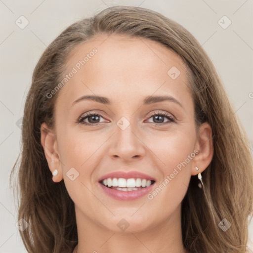 Joyful white young-adult female with long  brown hair and grey eyes