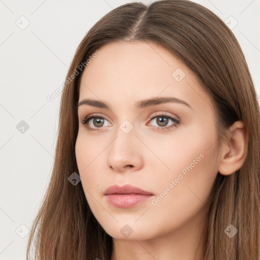 Neutral white young-adult female with long  brown hair and brown eyes