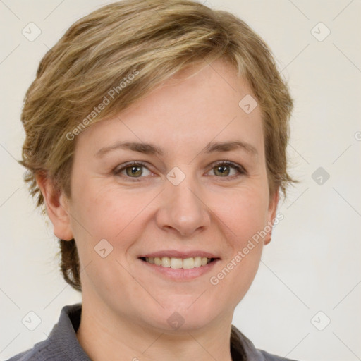 Joyful white adult female with medium  brown hair and blue eyes