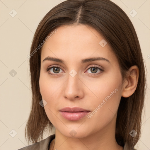 Neutral white young-adult female with long  brown hair and brown eyes