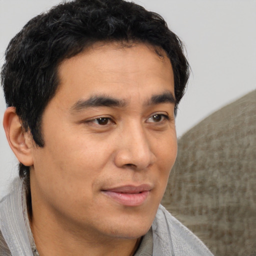 Neutral asian young-adult male with short  brown hair and brown eyes