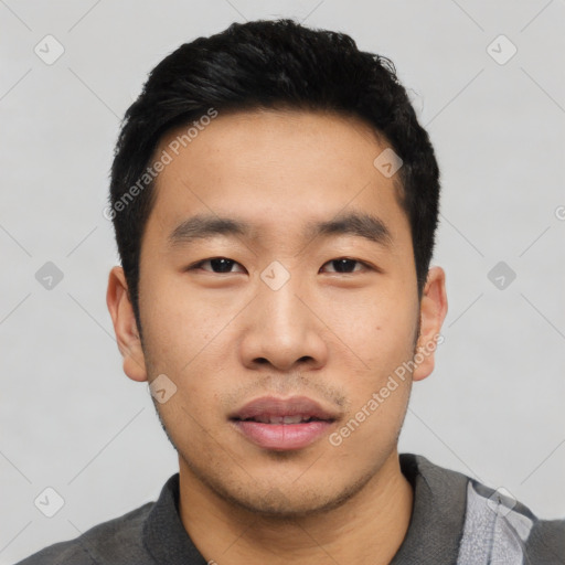 Neutral asian young-adult male with short  black hair and brown eyes