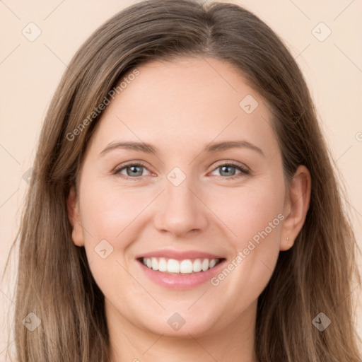 Joyful white young-adult female with long  brown hair and grey eyes