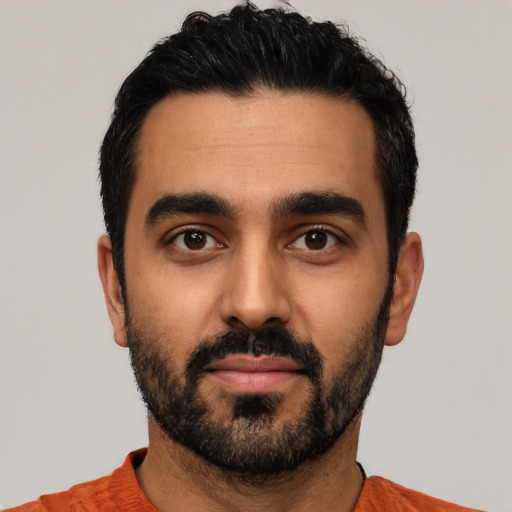 Neutral latino young-adult male with short  black hair and brown eyes