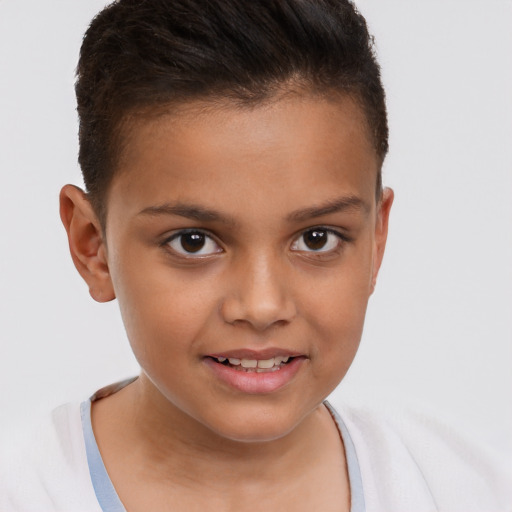 Joyful white child male with short  brown hair and brown eyes