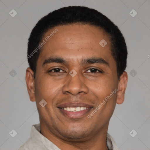 Joyful latino adult male with short  black hair and brown eyes