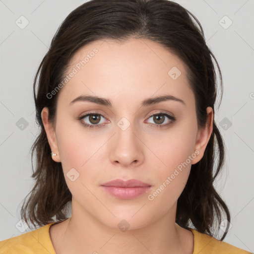 Neutral white young-adult female with medium  brown hair and brown eyes