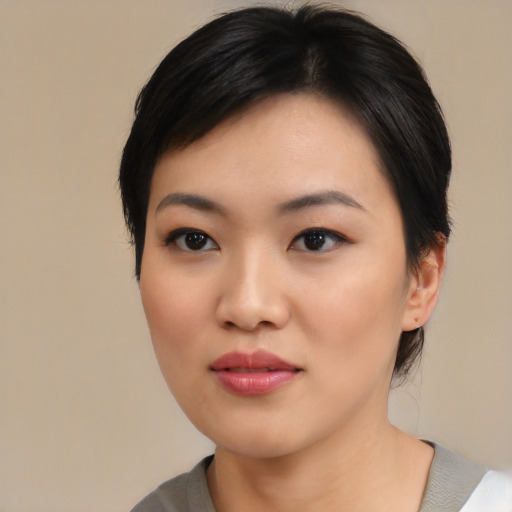 Neutral asian young-adult female with medium  black hair and brown eyes