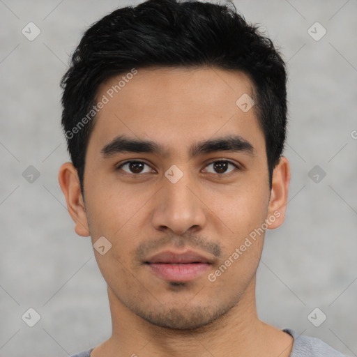 Neutral latino young-adult male with short  black hair and brown eyes