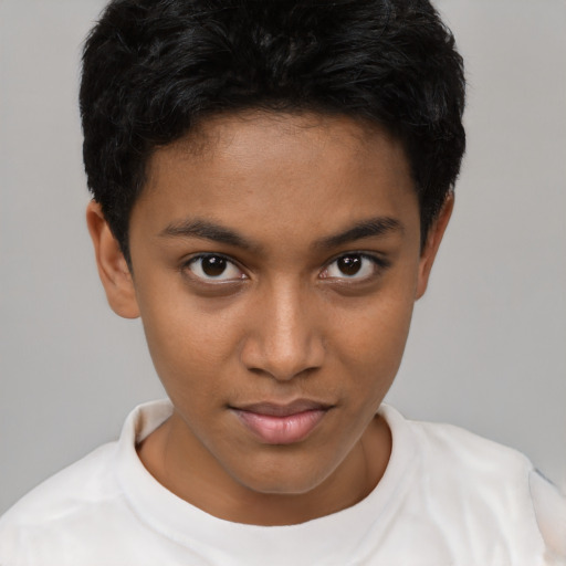 Joyful latino young-adult female with short  black hair and brown eyes