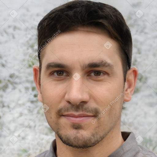 Joyful white young-adult male with short  brown hair and brown eyes